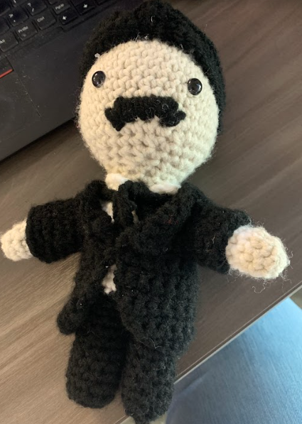 Queen_Badger's tweet photo. Yesterday, one of my students presented me with a handmade crocheted Edgar Allan Poe effigy. AMAZING work, August! He's perfect! @LISD_ECHS @EdgarAllanPoe https://t.co/NTwvPBnSuJ