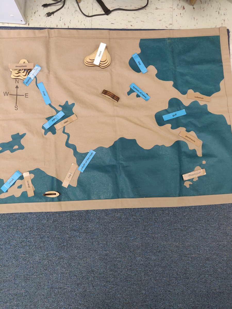 Channy_Bug's tweet photo. Ms. Kane at Dealey Montessori is presenting the Multiplication Stamp Game to FIRST GRADE students! Check out her other students working on the Wasceca Land and Water Form mats, and the Noun Grammar Box.
#publicmontessori
@ICanReadDallas 
@DrZoePagan 
@DrElenaSHill https://t.co/zB0juJJuw1