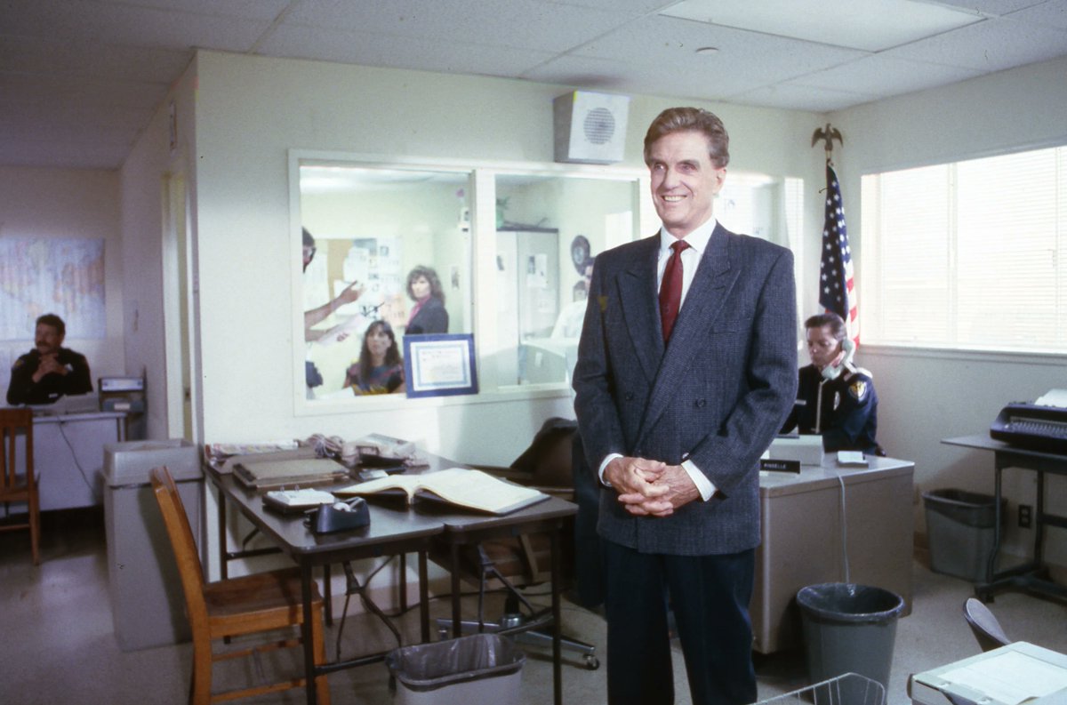 Unsolved's tweet image. Today, we honor the incomparable Robert Stack on his birthday. Enjoy these photos from the Unsolved Mysteries behind-the-scenes vault as we celebrate our lead detective! 🕵️ 🧥