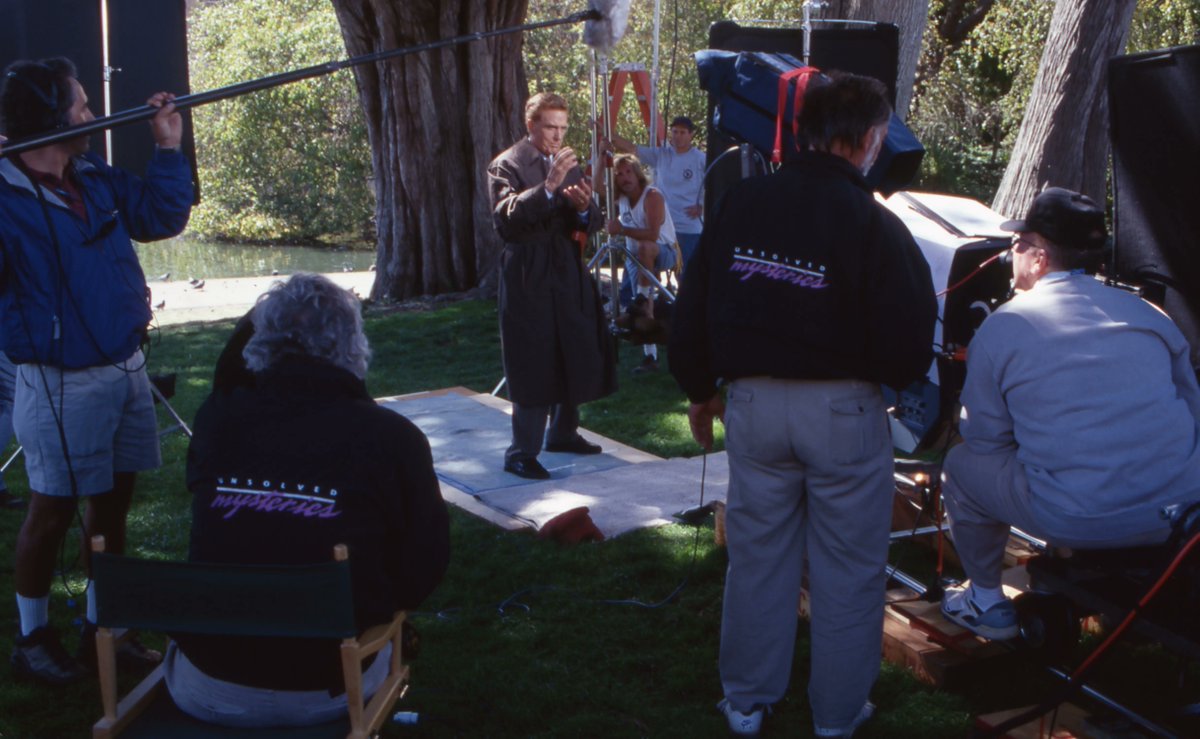 Unsolved's tweet image. Today, we honor the incomparable Robert Stack on his birthday. Enjoy these photos from the Unsolved Mysteries behind-the-scenes vault as we celebrate our lead detective! 🕵️ 🧥