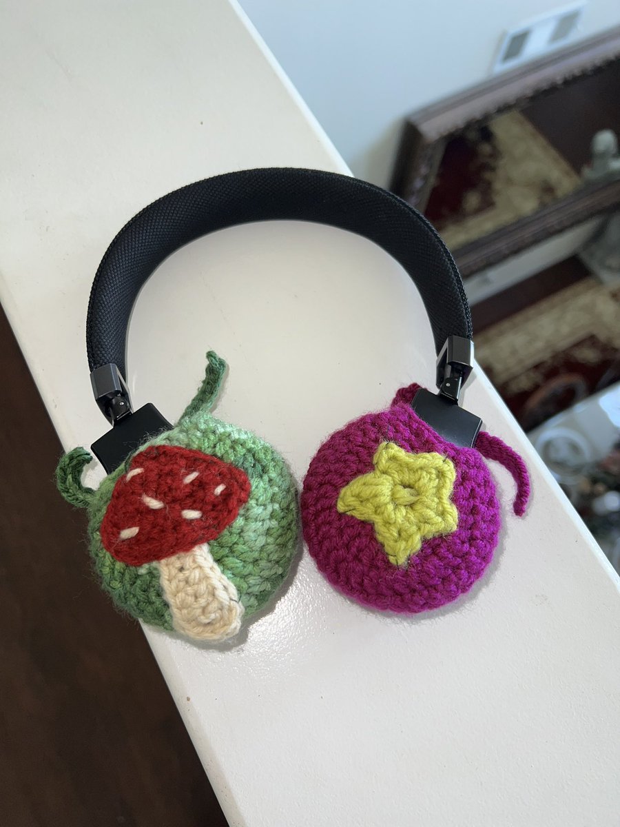 obsessed with the crochet headphone covers i made 🥹🍄⭐️