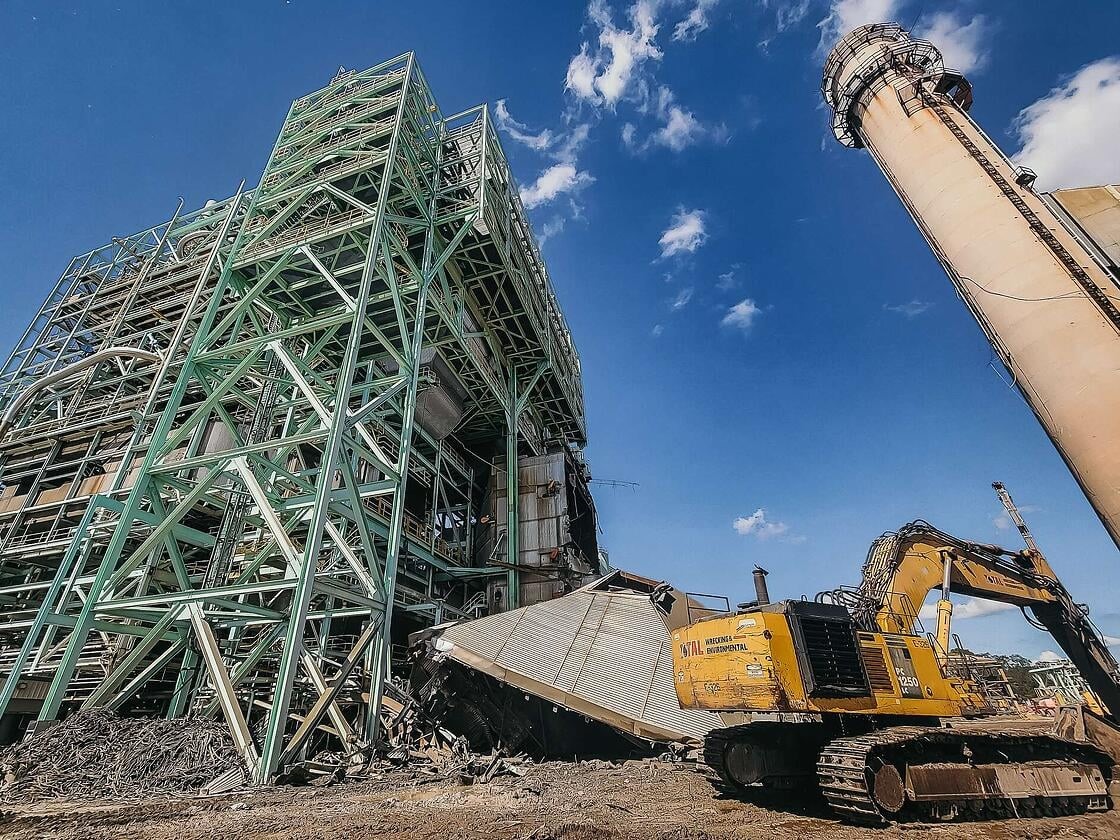 flpublicpower's tweet photo. At 8am ET, @TotalWrecking begins the 1st implosion phase of @mylkldelectric's C.D. McIntosh Power Plant by felling the 260-ft stack &amp; 90-ft Selective Catalytic Reduction (SCR) unit to make way for a new natural gas-powered plant--part of the utility's NextGen plan. #FLPublicPower https://t.co/3IM2RwKsBQ