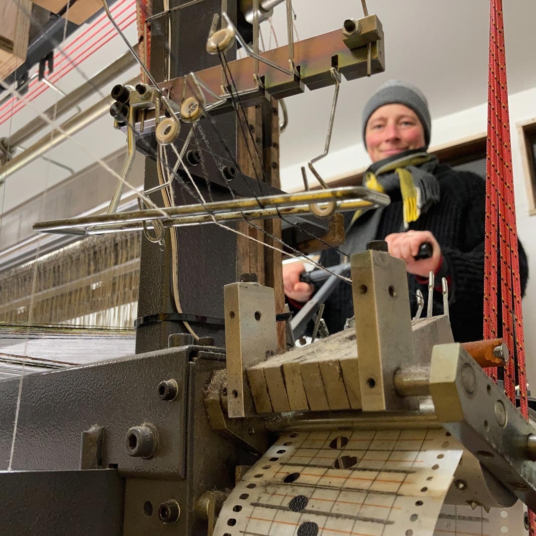 SkyeWeavers's tweet photo. Skye weaver - a loom's eye view! The hat and scarf are essential Skye winter weaving gear. ❄️ #skyeweavers #poweredbypedal #isleofskye #madeinscotland https://t.co/akgyMdYHdW