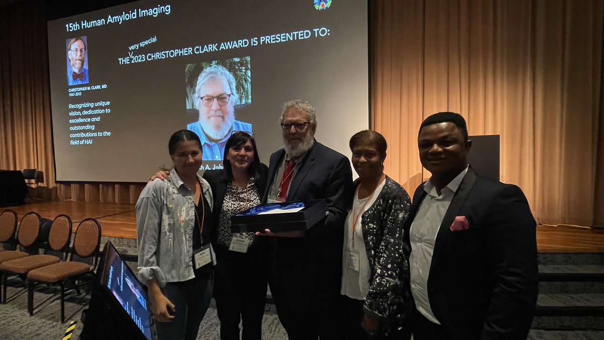 A very special 2023 Christopher Clark Award was presented to Dr. Keith Johnson by the HAI2023 Executive Committee: Drs. Beth Mormino, Teresa Gomez-Isla, Julie Price and Thomas Karikari.