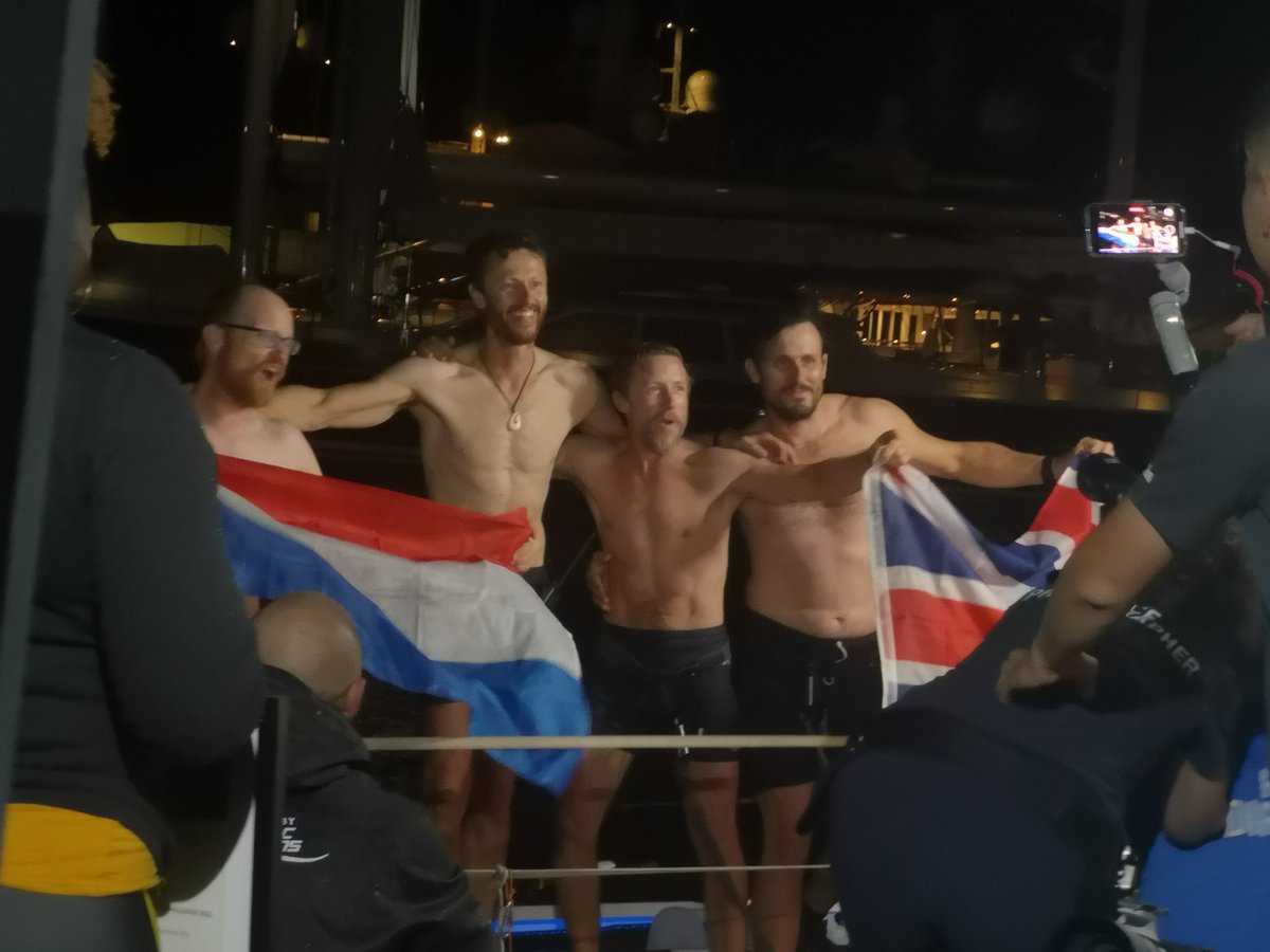 CarriePFord's tweet photo. #twac2022 great atmosphere here at #nelsonsbboatyard as the Anglo-dutch team pulls in after 3000 miles across the Atlantic https://t.co/my8YBbCgjA