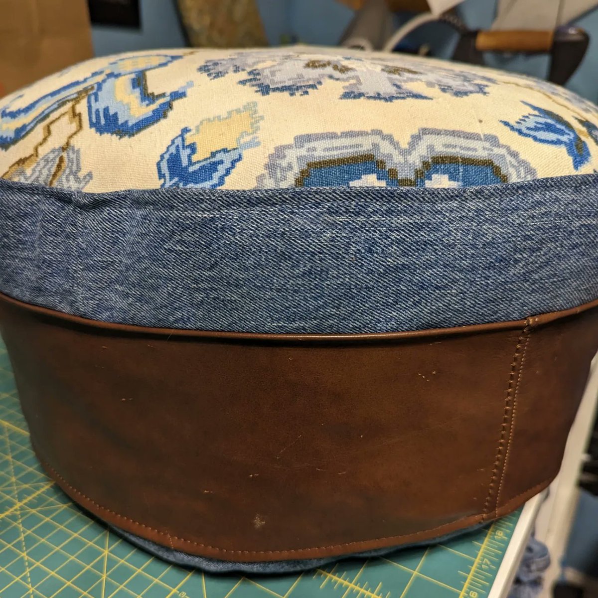 UpcycleTexStyle's tweet photo. I made this lovely little footstool yesterday. Made from recycled jeans, curtain &amp; leather couch.  It's stuffed with discards from sewing and clothing that cannot be repaired! Check out my shop it will be up there soon!

#ottawa #landfilldiversion #zerowaste #restyourfeet https://t.co/ZyQAAtMqQS