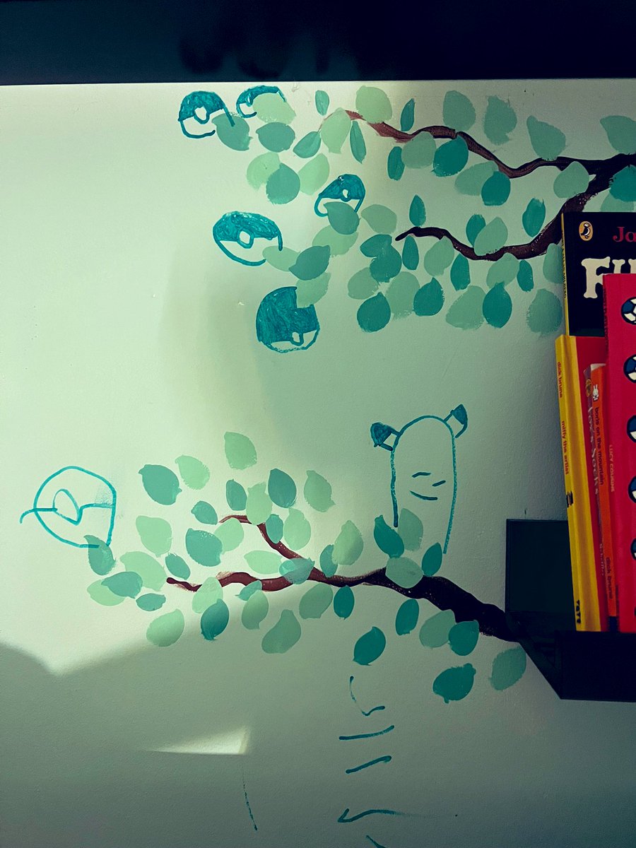 MotionsNft's tweet photo. Discovered an addition to the book tree I painted for my son. He’s Pokémon crazy at the moment and decided to make it grow poke balls. 😅😍 https://t.co/3qKvuZm7QH