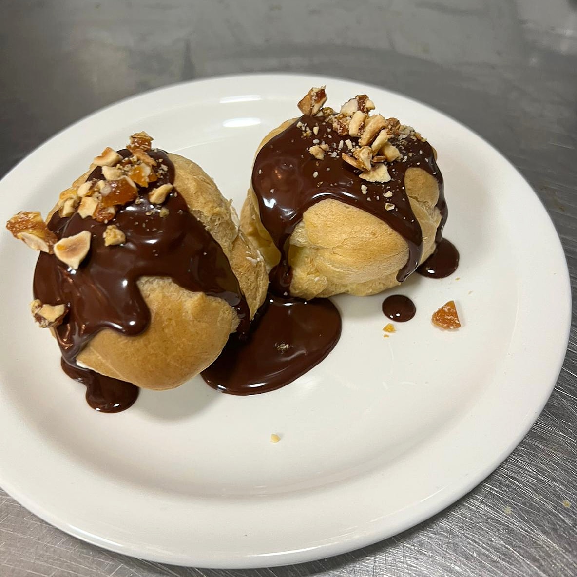 Hazelnut Cream Profiterole and Espresso Chocolate Sauce

Join us for lunch, dinner, and dessert. Reserve a table at andrewedmunds.com