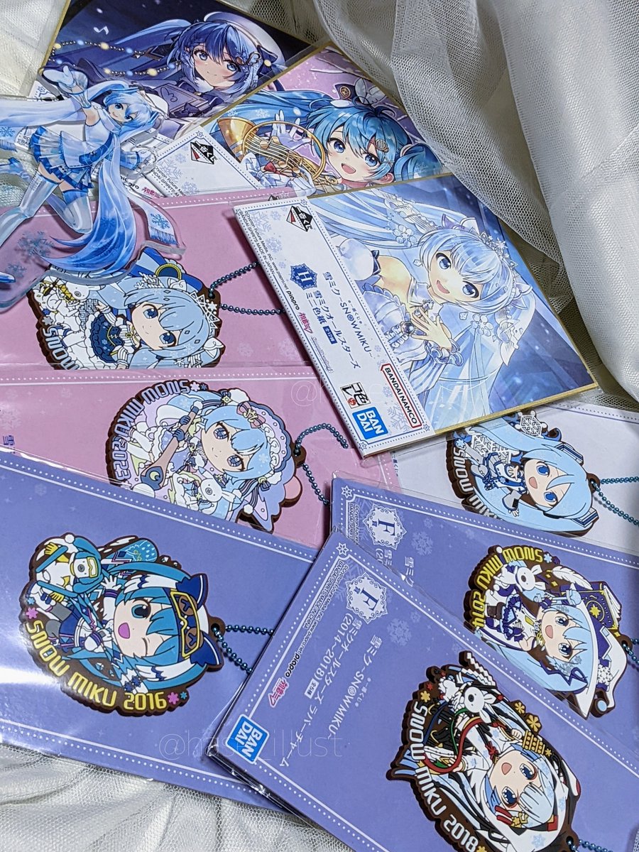 hatsune miku ,rabbit yukine ,yuki miku light blue hair multiple persona tiara snowflake print twintails musical note blue hair  illustration images