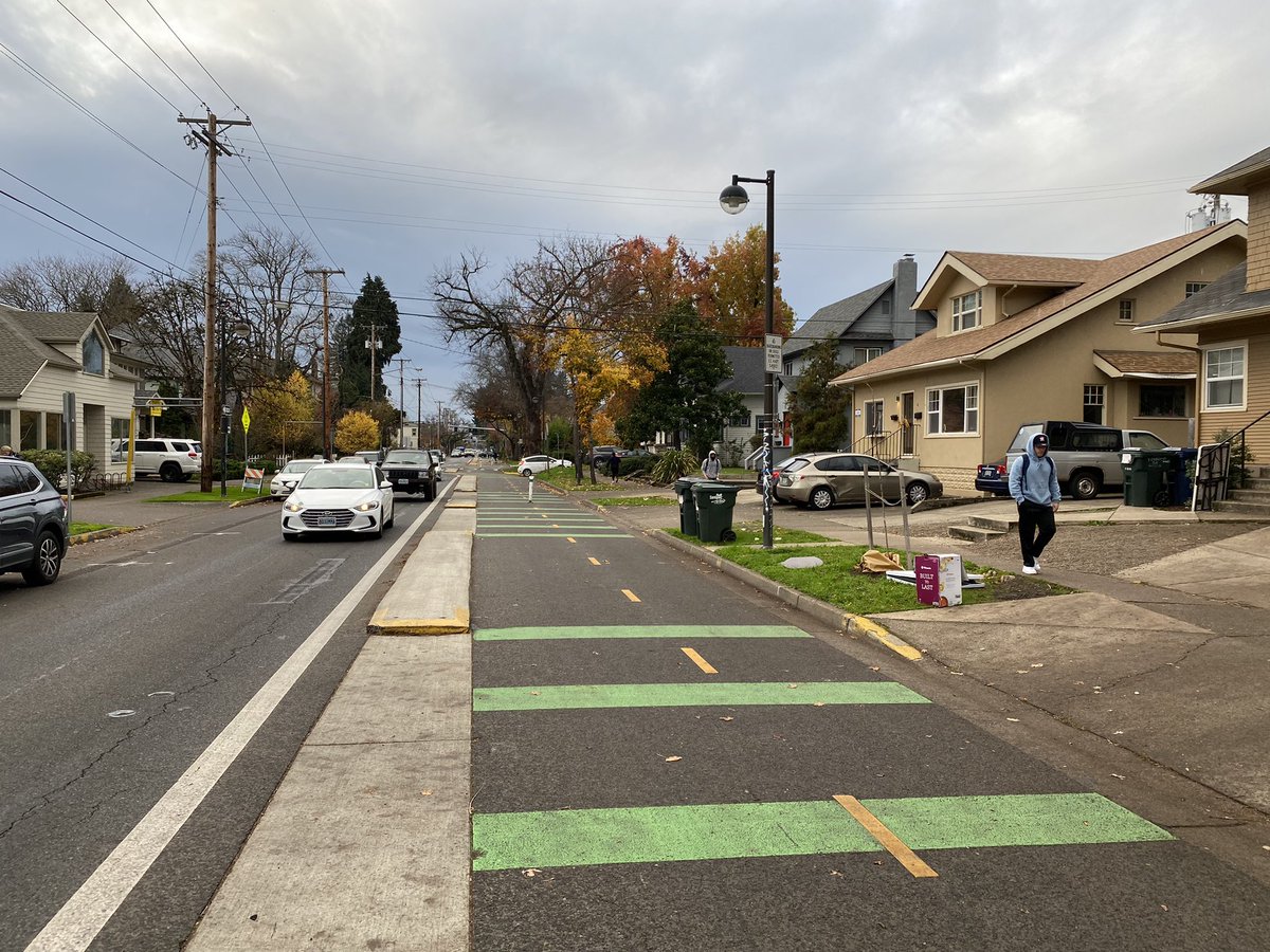 AlexGanassini's tweet photo. @uglyshirt @GregMillerSTC @dt_stcatharines Until more people are able to get downtown without a car, more people will want to prioritize cars over people. 
Pedestrianizing downtown needs to go hand in hand with better bike infra, transit, sidewalks, and more residents living downtown. A few flexposts don't cut it. https://t.co/UofxUyrbK7