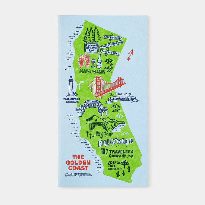 This cover feature a stylized map of California against a baby blue background. It features a lot of the major landmarks like the Hollywood Sign, and the Golden Gate Bridge. It is also branded with Traveler's Company USA.