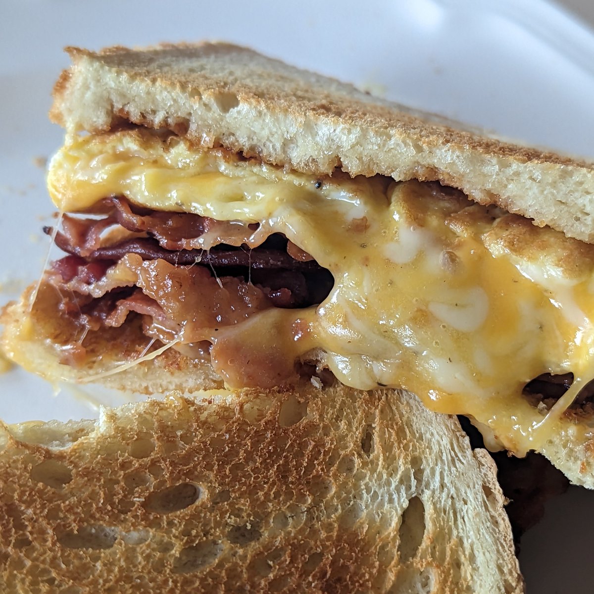 Another weekend another breakfast sandwich! One of these days I will make one for myself, in the meantime the kiddo loves them!

#breakfast #bacon #baconandeggs #baconsandwich #eggsandwich #breakfastsandwich #happykid #cheese #toastedsandwich #smokinghotdad #lovebacon