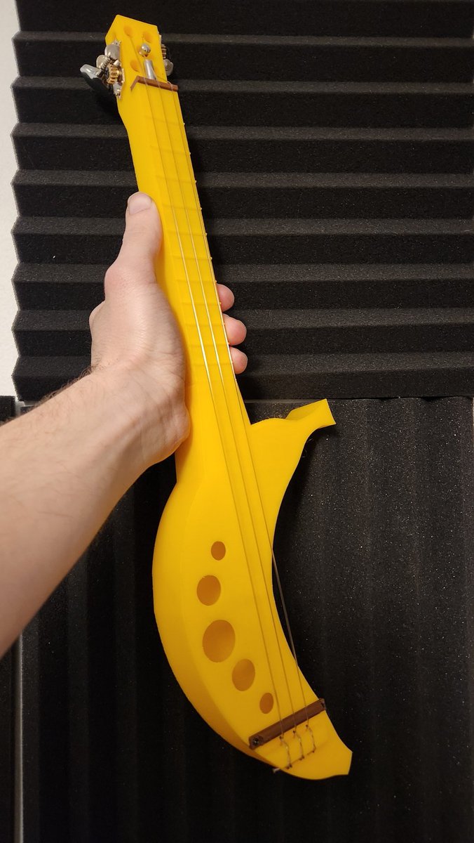 grhmhomelinux's tweet photo. I designed a banana guitar that can be 3D printed. Printed in Polymaker yellow polylite pro pla. #bananaguitar #3string #guitar #3dprinting #3dprinted #Fusion360 #music https://t.co/lF5IPQEroZ