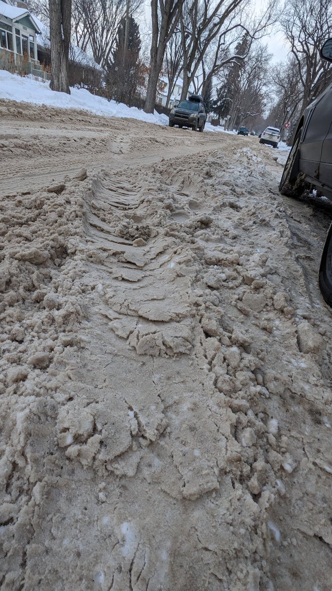 activedadbod's tweet photo. When the @CityofEdmonton threatens you with $100 fine for your sidewalks, even though they're preeettty clean but your front Street looks like train tracks https://t.co/pkDe0Zcc7X