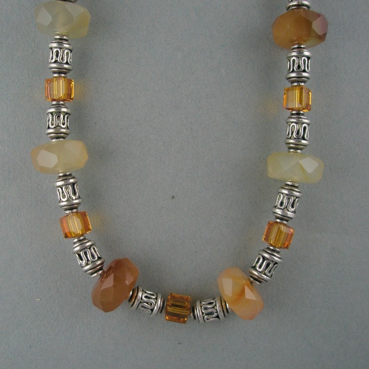 stoneberri's tweet image. Faceted Carnelian and Swarovski Crystals Mix with Sterling Silver Spacers on this Necklace tuppu.net/d842a292 #Etsy #Stoneberri #ToggleClosure