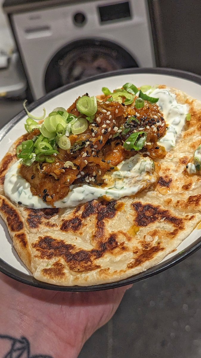 I've outdone myself here - Honey, Soy and Ginger braised Tofu (@meerasodha - East) served in a Garlic Paratha with a Coriander Yoghurt.