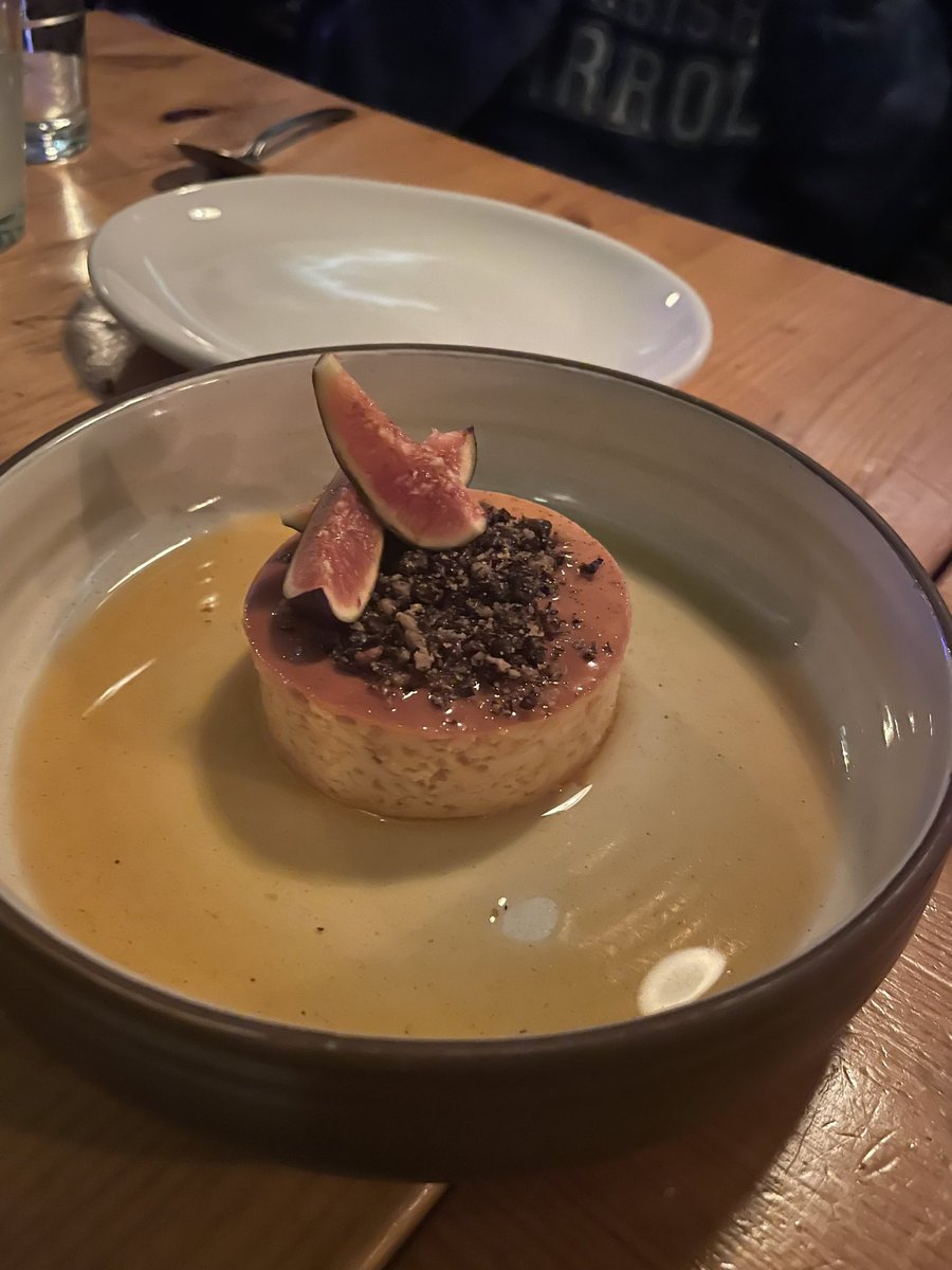 Flan topped with smoked black ants