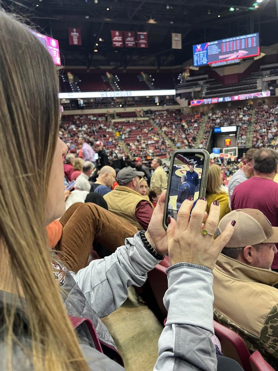 CEOofTesla1em's tweet photo. These pics of an FSU fan’s wife taking pics of Tony during today’s game are priceless #GoHoos https://t.co/xq7O4n1jU9
