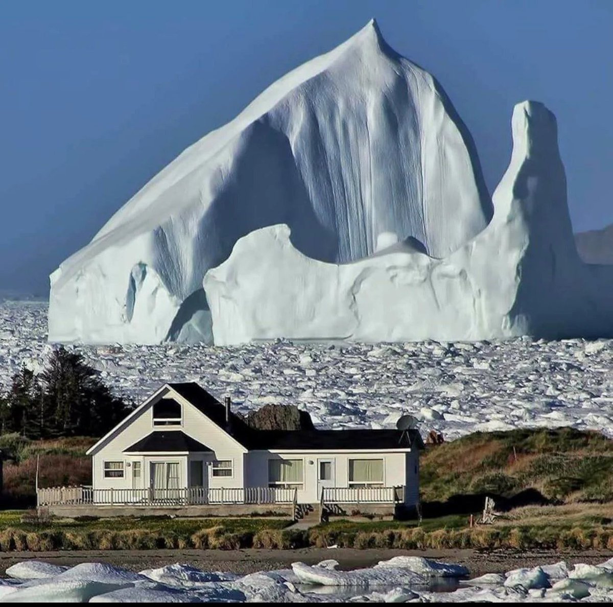 A 150 ft. Iceberg passing through Iceberg Alley near Twillingate, Newfoundland, Canada.