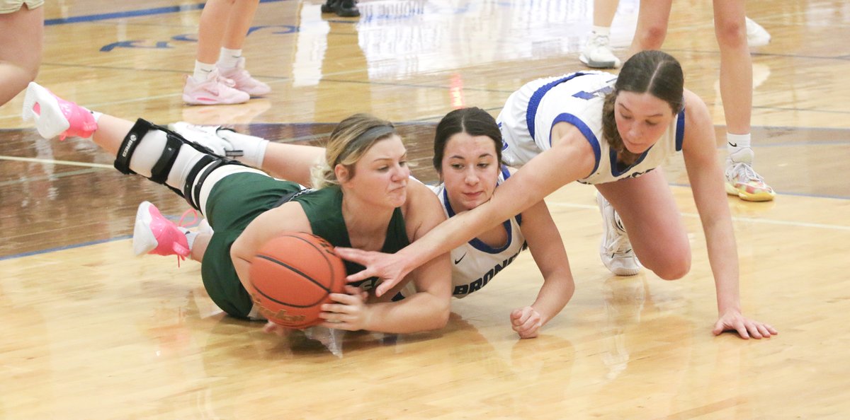 GBB: <a href="/KarleyNaber/">Karley Naber</a> (center) and <a href="/coraepayne15/">Cora Payne</a> of <a href="/CPS_GBB/">Centennial Broncos Girls Basketball</a> battle for the ball against Central City Jan. 14. #broncoblue #thegameiseasieronyourfeet #orsoiveheard