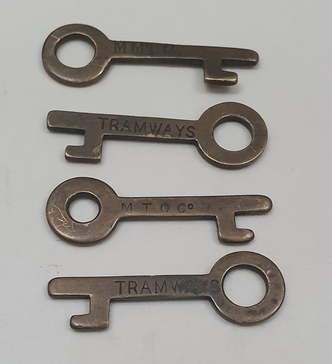 At our open day yesterday, a collector popped in with series of small brass keys were used for - each engraved on with either MMTB, TRAMWAYS or MTOCo.
Despite never having seen one of these before, we do have an idea of their purpose....but we're wondering what you think.