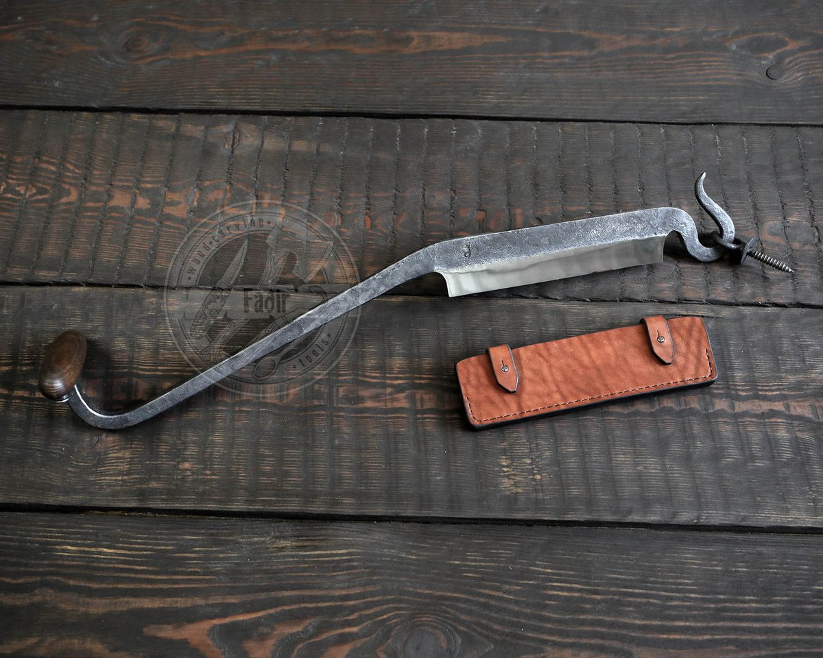 BjorkBrodern's tweet image. Clog maker from the Netherlands demonstrate the use of a clogging knife. A long blade with hook on the one end and a handle on the other.