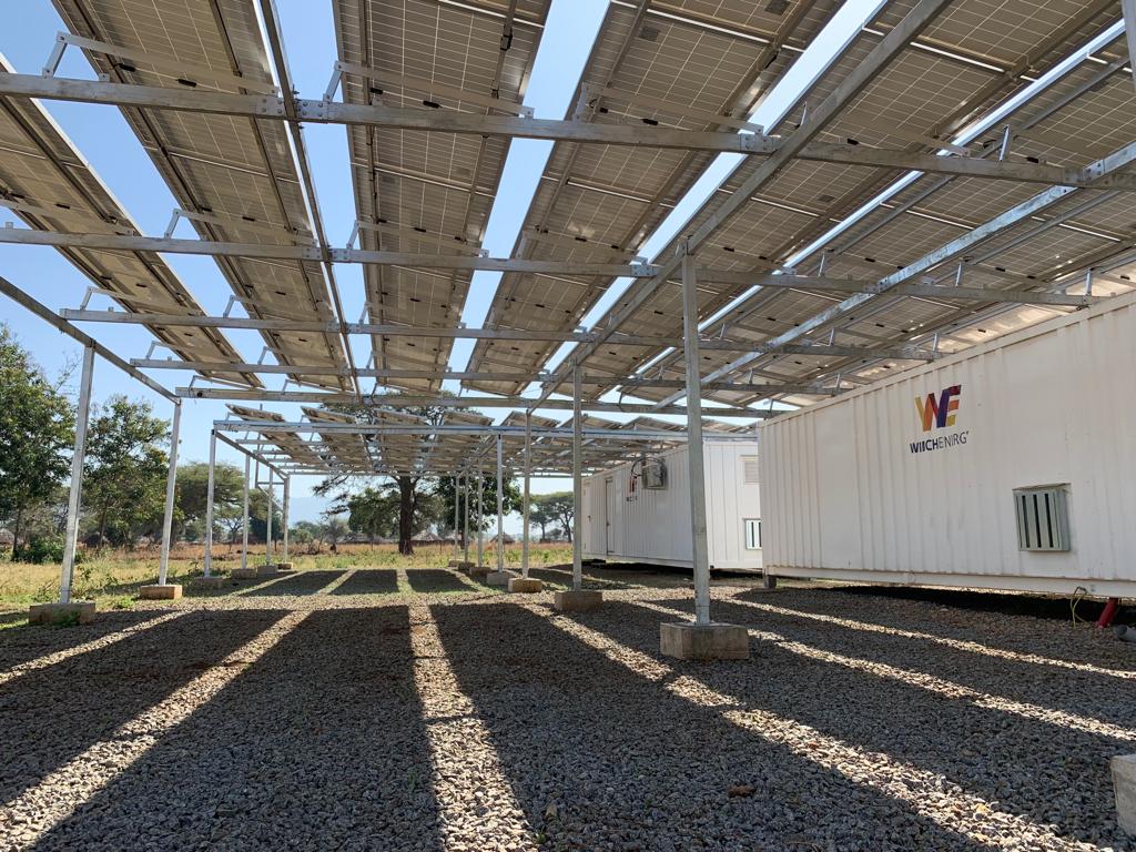 JessKersey1's tweet photo. Made the trip up north to Lamwo district of Uganda with @samuelbmiles to visit @WinchEnergyLtd's fleet of solar minigrids. Interesting example of a containerized/standardized technology enabling rapid deployment - nearly 25 sites were built in less than two months. #SDG7 https://t.co/LWGwIxdsvY