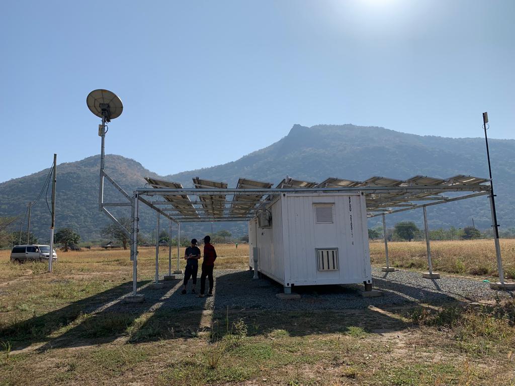 JessKersey1's tweet photo. Made the trip up north to Lamwo district of Uganda with @samuelbmiles to visit @WinchEnergyLtd's fleet of solar minigrids. Interesting example of a containerized/standardized technology enabling rapid deployment - nearly 25 sites were built in less than two months. #SDG7 https://t.co/LWGwIxdsvY