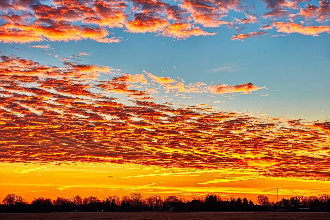 Sunrise, LaSalle Ontario this morning. A friend of mine comes to our barnyard every once in a while to shoot pictures.  This is 1 he took this morning Jan, 15 2023.  Credit to Aaron Thomson.