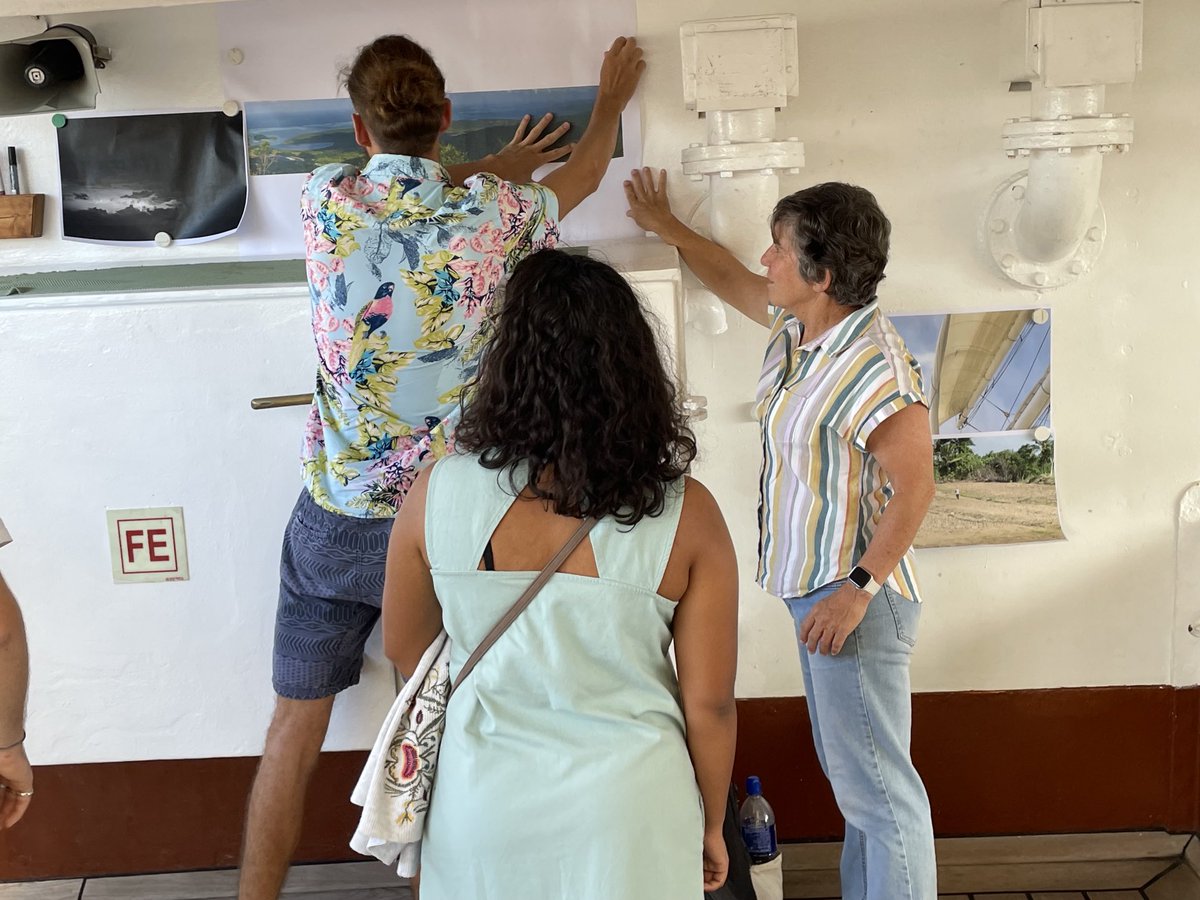 Students putting up posters on board tall ship Statsraad Lehmkuhl as part of the #OneOceanExpedition during an #SDG14 event organised by @UiB and ⁦@IAU_AIU⁩ in Cape Town. 🐠🐬🦞🦑🌊 ⁦@KatjaEnberg⁩ ⁦@OyvindFiksen⁩ ⁦@VantlandH⁩ ⁦⁦@UCT_news⁩