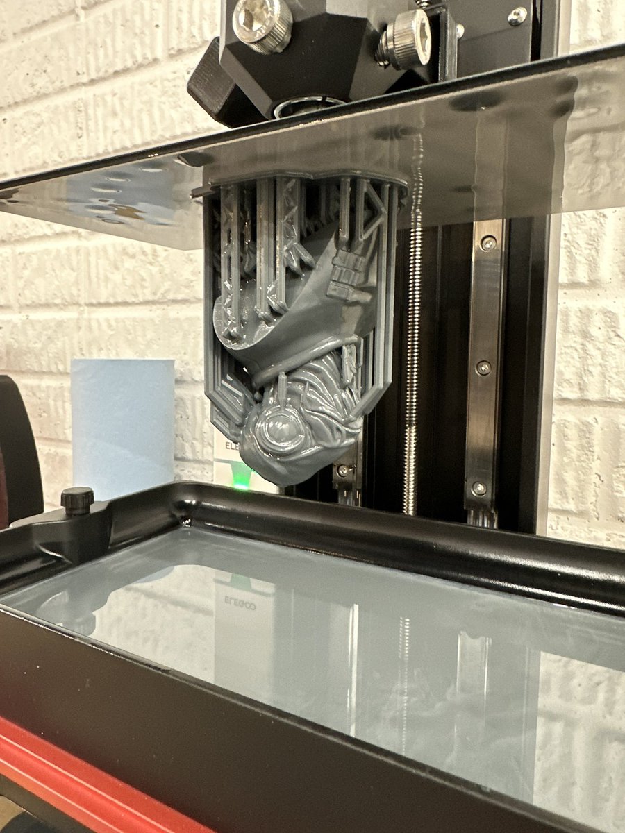 jonschwenn's tweet photo. It’s a trap! First successful resin print that I sliced. Went overboard on supports just to make sure it didn’t fail. #3Dprinting https://t.co/HhjE0uTyZY