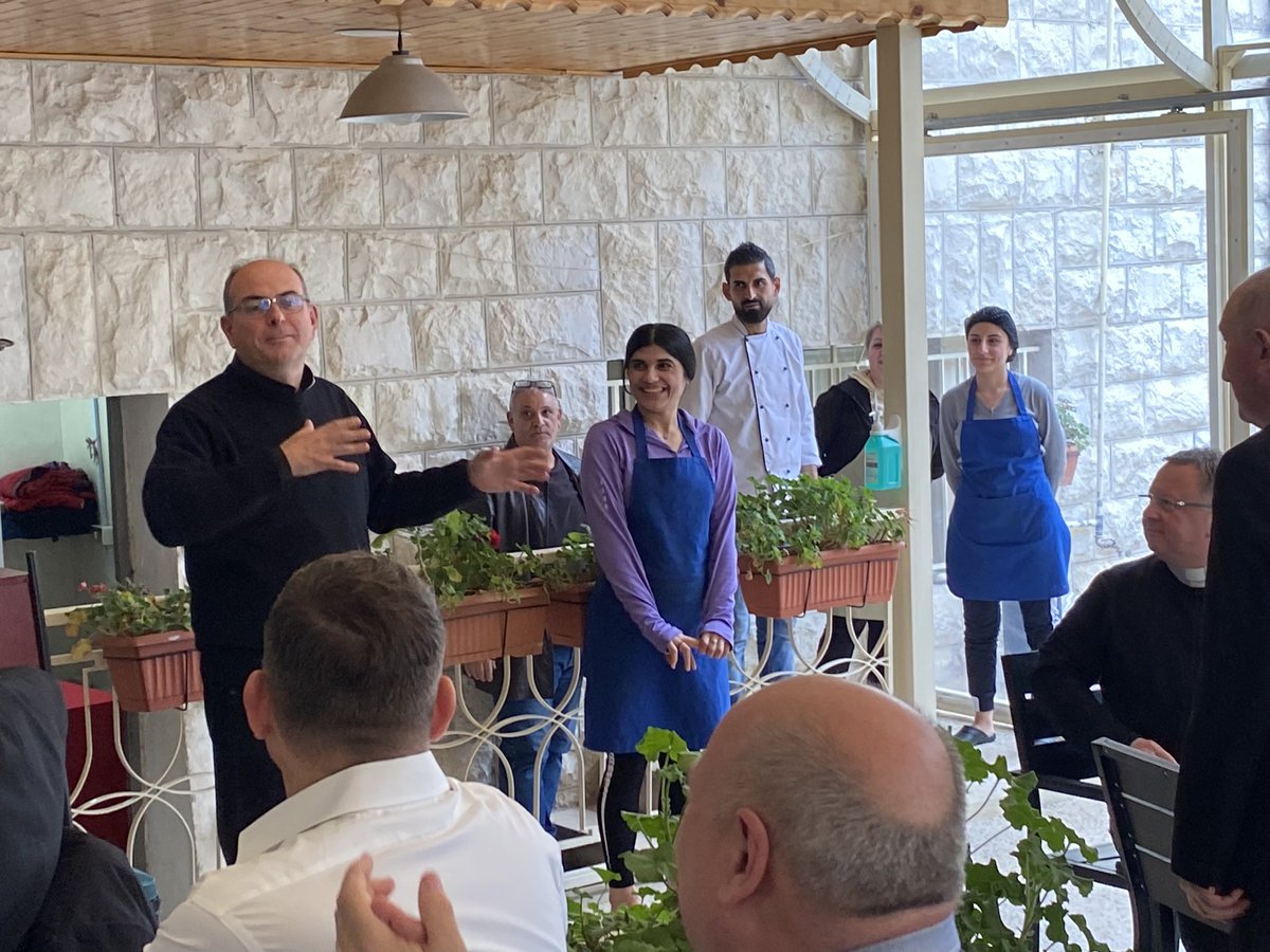 BishopSouthwark's tweet photo. Our good friend Fr Mario Cornioli welcoming #HLC23JORDAN at Mar Yousef Jabal as he once would welcome us to Holy Family Parish Gaza sharing his passion to keep hope alive for young Christians facing hardship by equipping them with life skills #Rafedin #PizzaProject #TasteandSee https://t.co/IbWYIgy4LJ