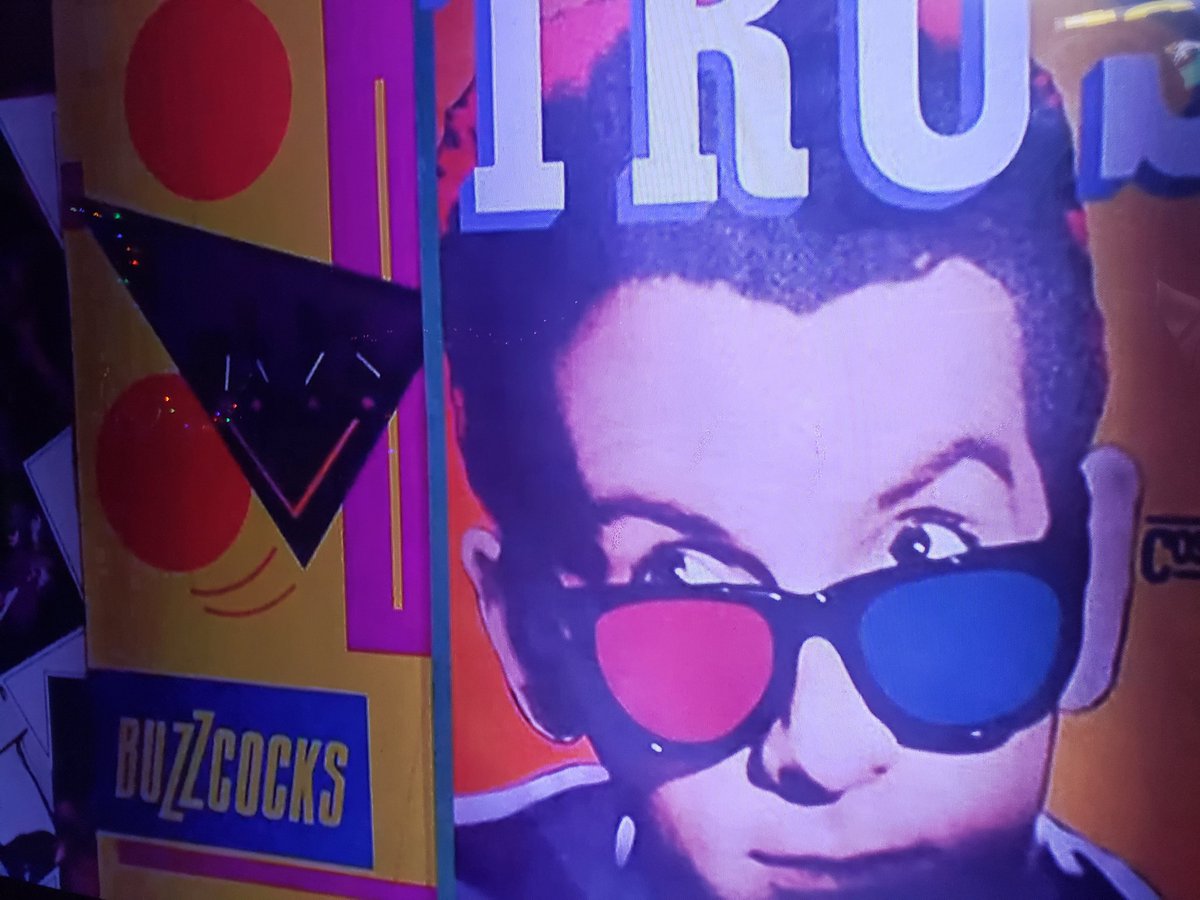 Just noticed the skeevy scalper from Fast Times at Ridgemont high has an awesome Buzzcocks poster