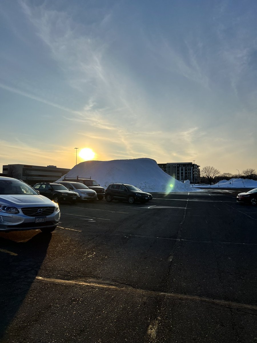 iado's tweet image. climbed up the Big Minnesotan Parking Lot Snow Pile today