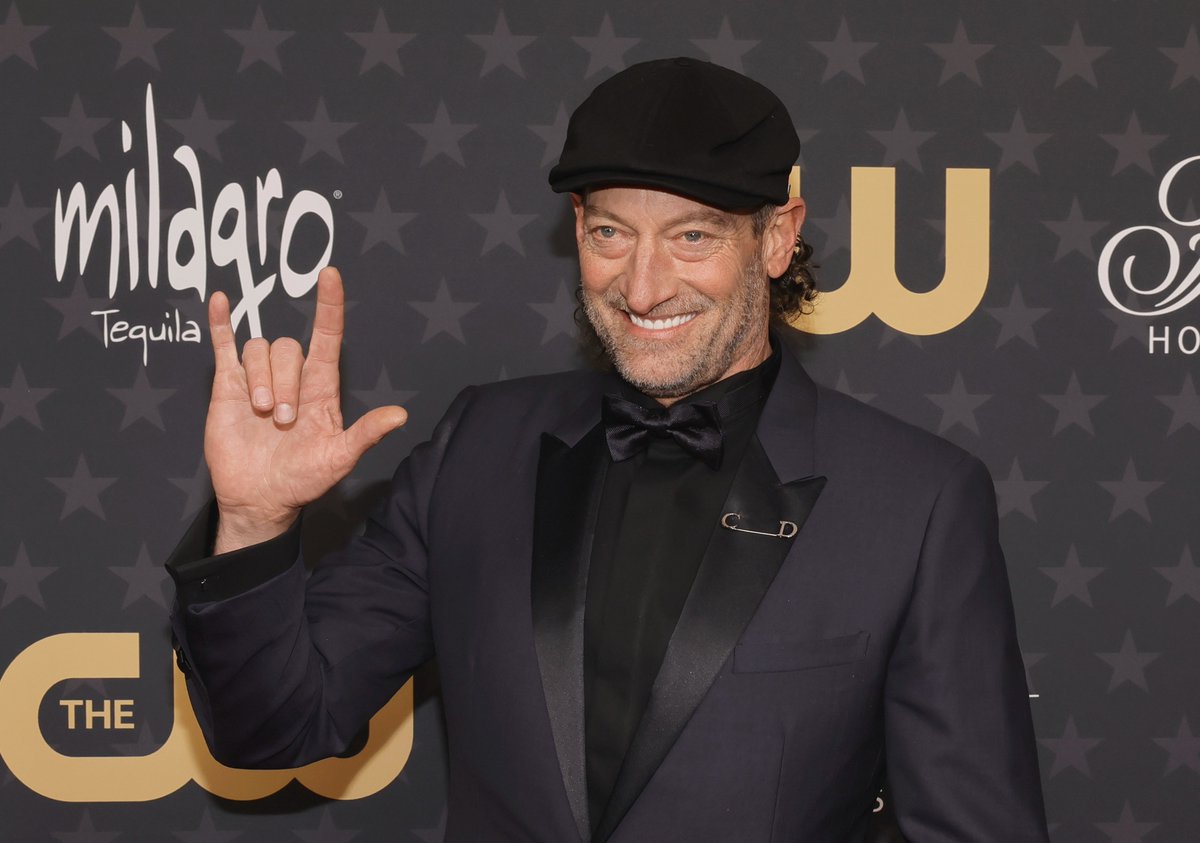 THR's tweet photo. #CODAfilm star Troy Kotsur shares the love on the #CriticsChoiceAwards red carpet https://t.co/biMqg2E2c4
