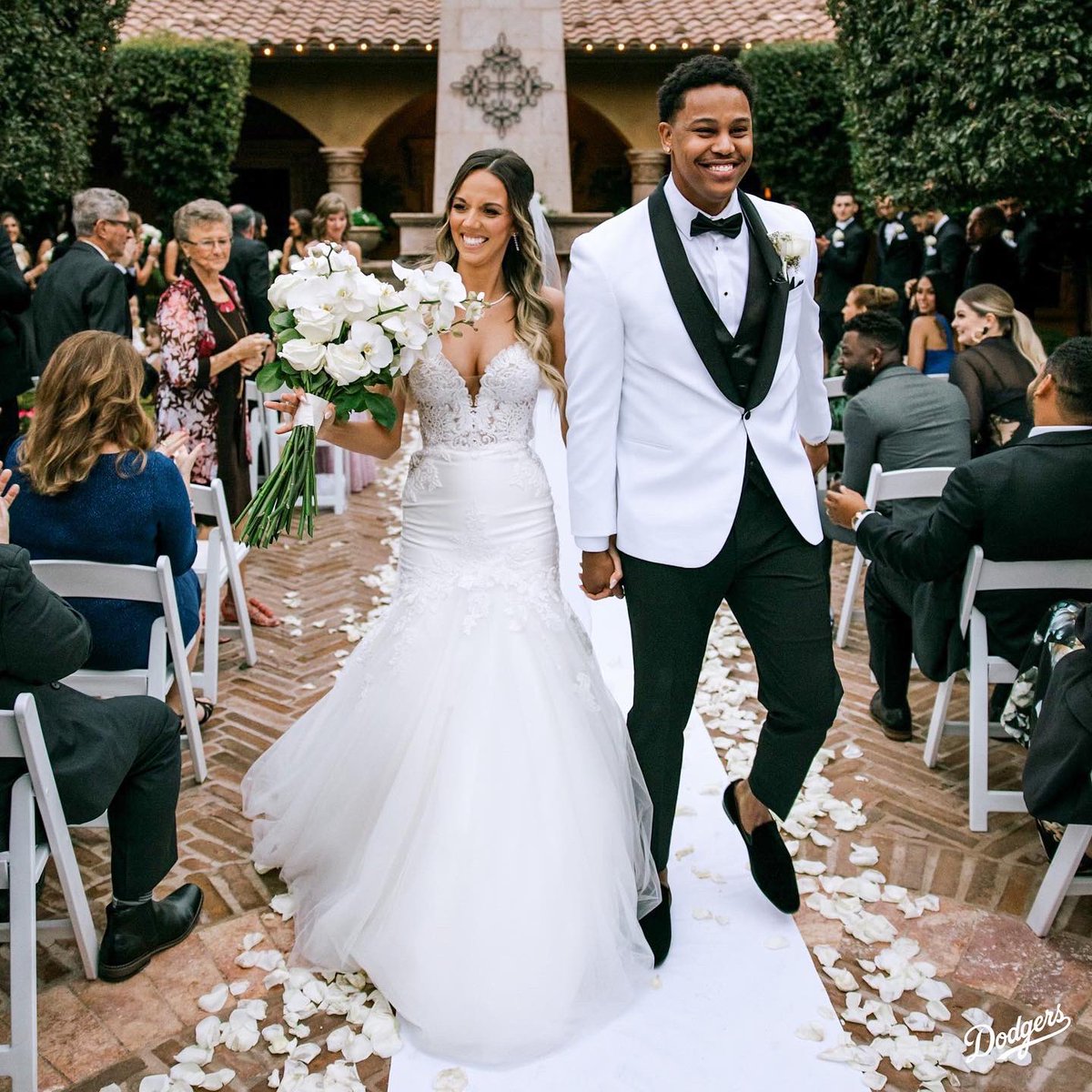 Dodgers's tweet photo. The Almontes. 

Congratulations @showtimealmonte and Tori on your wedding! https://t.co/s1aQDqI4vJ