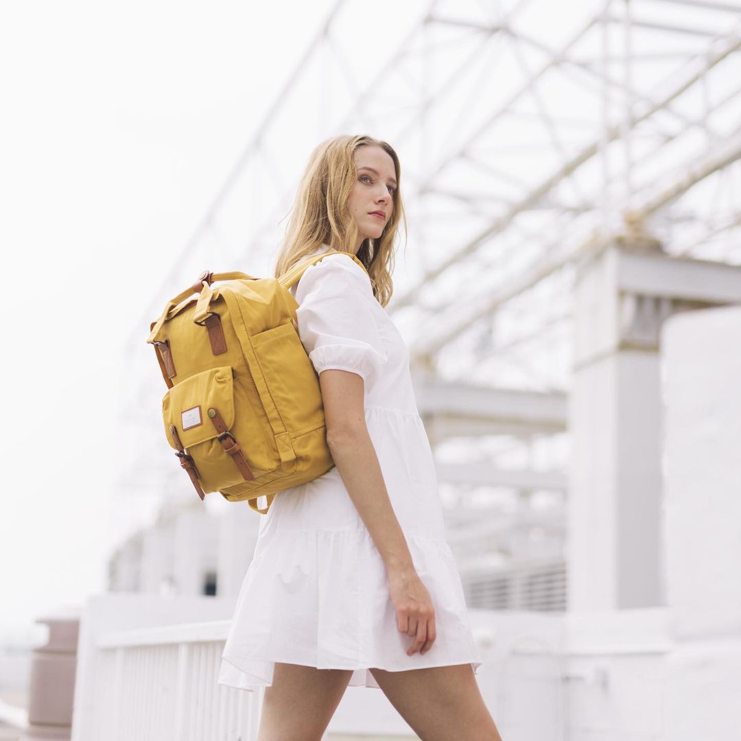 Making my way downtown, walking fast🎶&amp; Macaroon makes me pop up in the crowd. Macaroon is not only a fashion piece but also essential for packing(&amp; stay organized) for an eventful day. 
#DoughnutOfficial #PackYourDream #DreamyJourney
