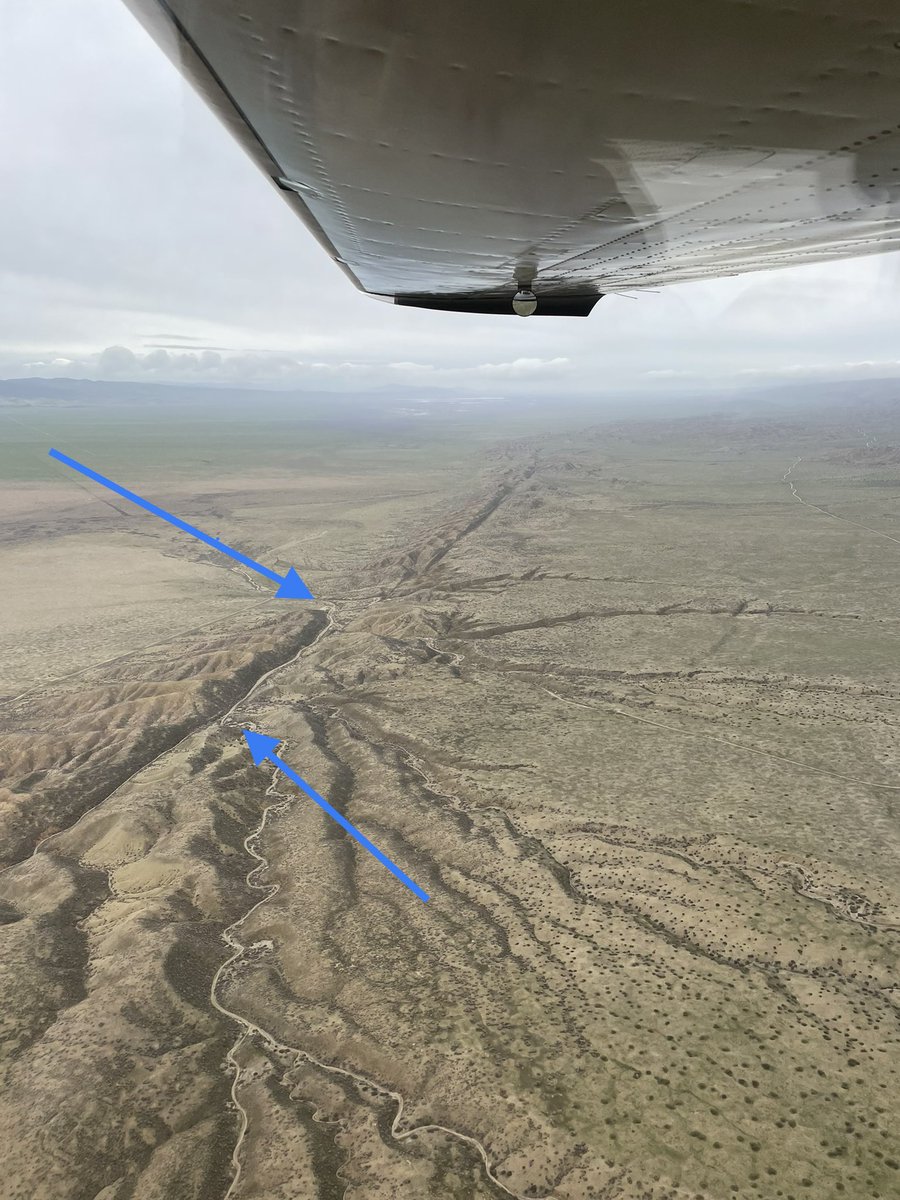 Flight over San Andreas fault today.  The blue arrows show a creek, which would have lined up at some point in history!