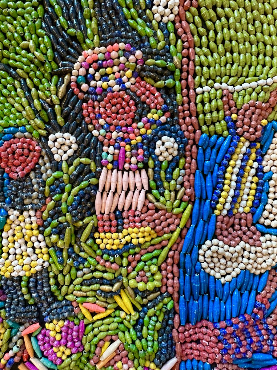 Created as testimony to their life following their abduction during the war in Uganda, WAN women made each bead by hand and sewed it onto an 8 x 6 tapestry. Each bead a memory of loss, and a reclaiming of beauty.