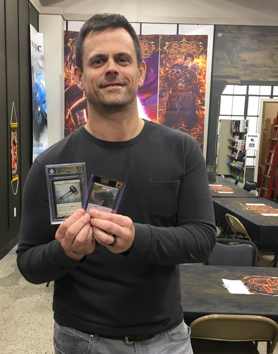 ClarkJ_FAB's tweet image. Before I opened the prize card I jokingly said I might cry if it’s Crater Fist, and when it happened, I was emotional. #fabtcg (and Bravo) has been such a fun and fulfilling hobby the last few years.  Headed to Baltimore!