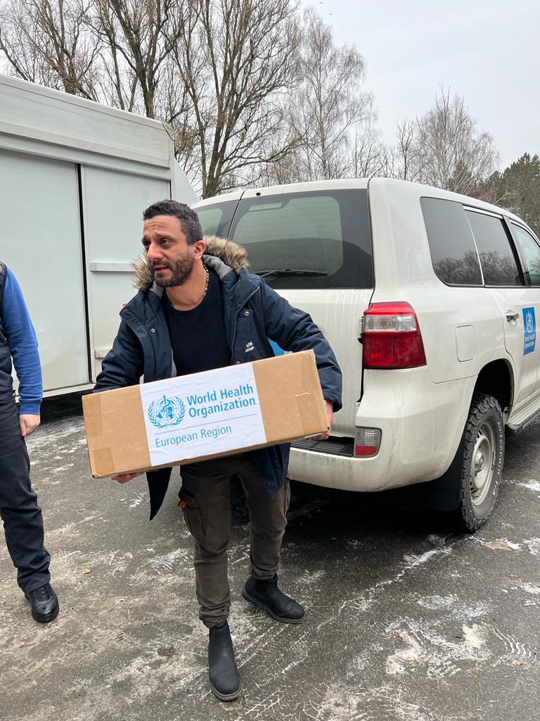 WHOUkraine's tweet photo. WHO has delivered medicines to help treat those injured following a strike on a residential building in Dnipro over the weekend that killed and injured dozens of civilians. Support for the medicines has been provided by @SwissUA and @CanEmbUkraine https://t.co/PeVzO4bgDm