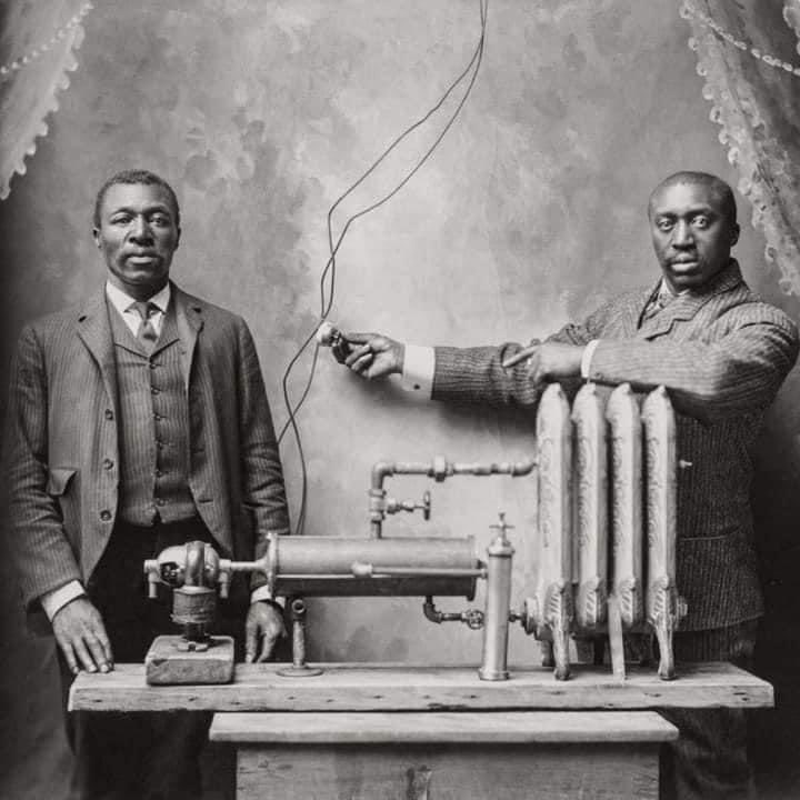 MikeBaggz's tweet photo. Black American inventor Charles Lewis Baker (to the right) standing next to his invention The Friction Heater. Baker was born into slavery in 1859 and died in 1926. 

Also, to put it in context of how recent slavery was in the US, my great grandmother was 11 at the time he passed https://t.co/vEN2n9LG7v