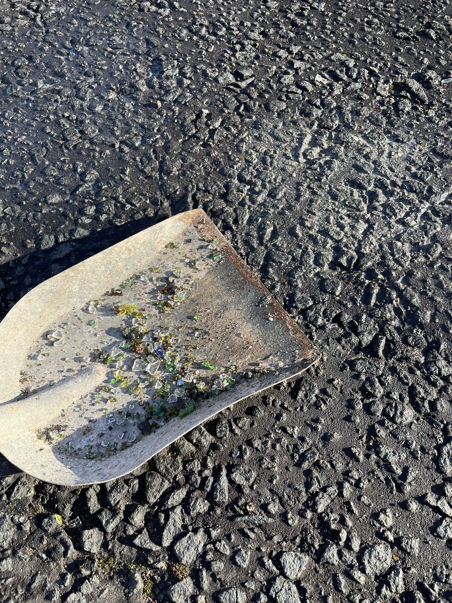 NotJustCards's tweet image. As if potholes (craters) in the road weren’t bad enough @EastRenCouncil I came home to discover the green bin lorry had not only smashed a bottle outside our drive but dragged it’s remnants up the street, glass which I then drove over unable to see due to sun glare 😡