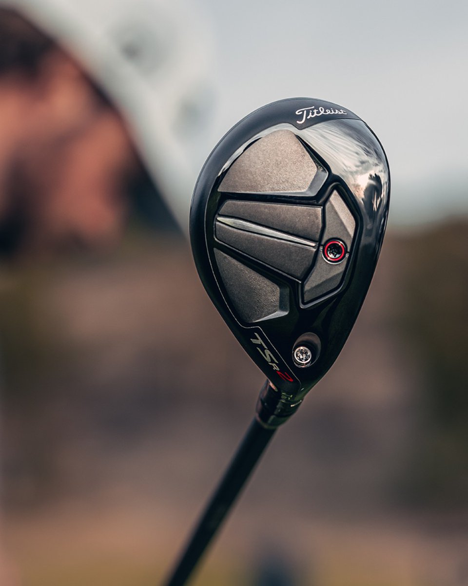 Titleist's tweet image. New #TSR2 and #TSR3 hybrids have arrived. 🔥

Making their TOUR debut this week at @theamexgolf and avail. for fittings on 2/2, these new additions to the #TSR family bring advancements and refinements that benefit players seeking long iron alternatives: bit.ly/3q6h0Xk
