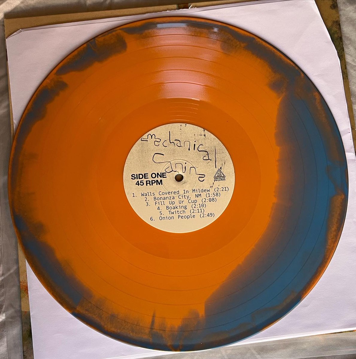 mechk9's tweet photo. What’s up? The vinyl for our new album “Walls Covered In Mildew” arrived over the weekend! Here’s the online exclusive variant, limited to 107 copies. You can find this at https://t.co/KEpLvGNQk7 for only $15!! What a steal!! 

Orders will ship THIS WEEK!!
No extended preorder!!! https://t.co/056uxoWjU3