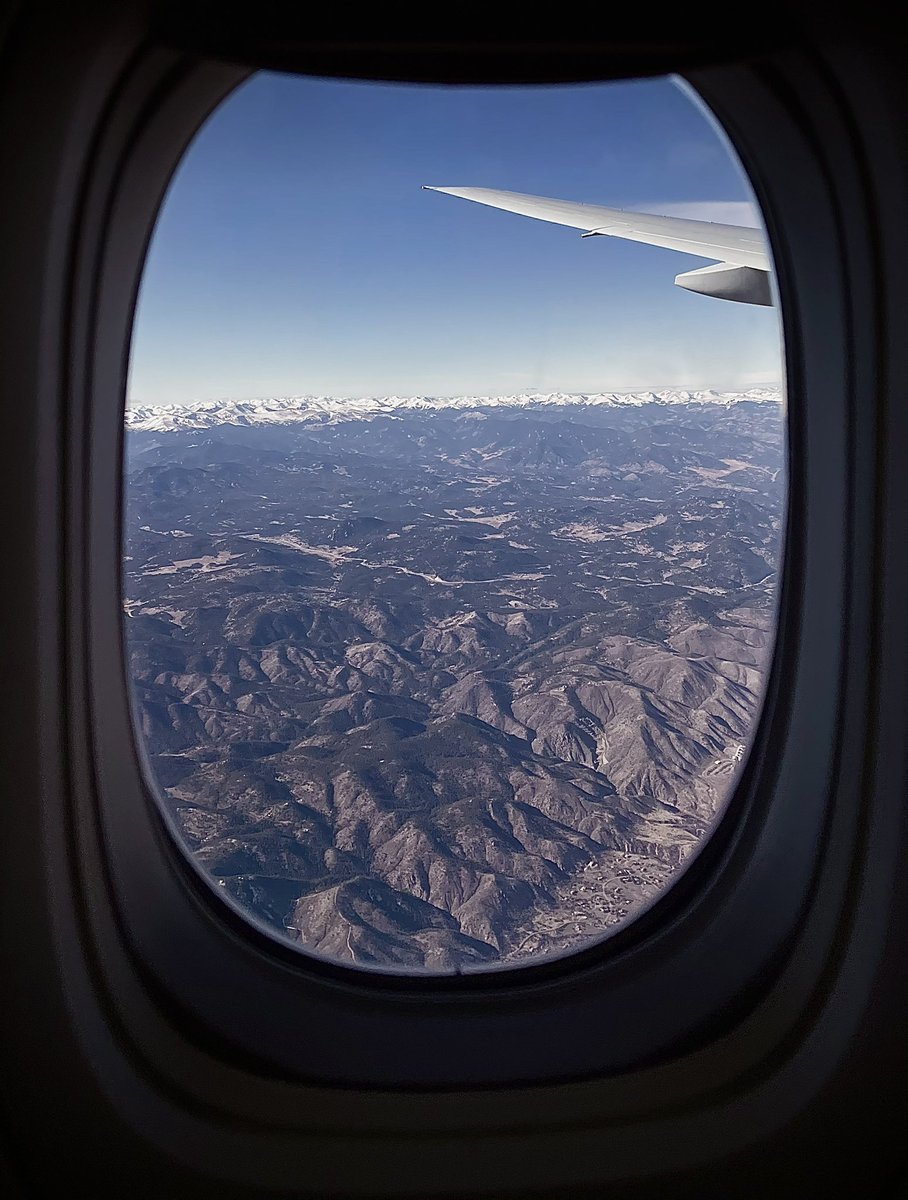 IFSSarah's tweet photo. The snow capped Rocky Mountains have a different look from a @united plane #travel https://t.co/gSciE9BnaX