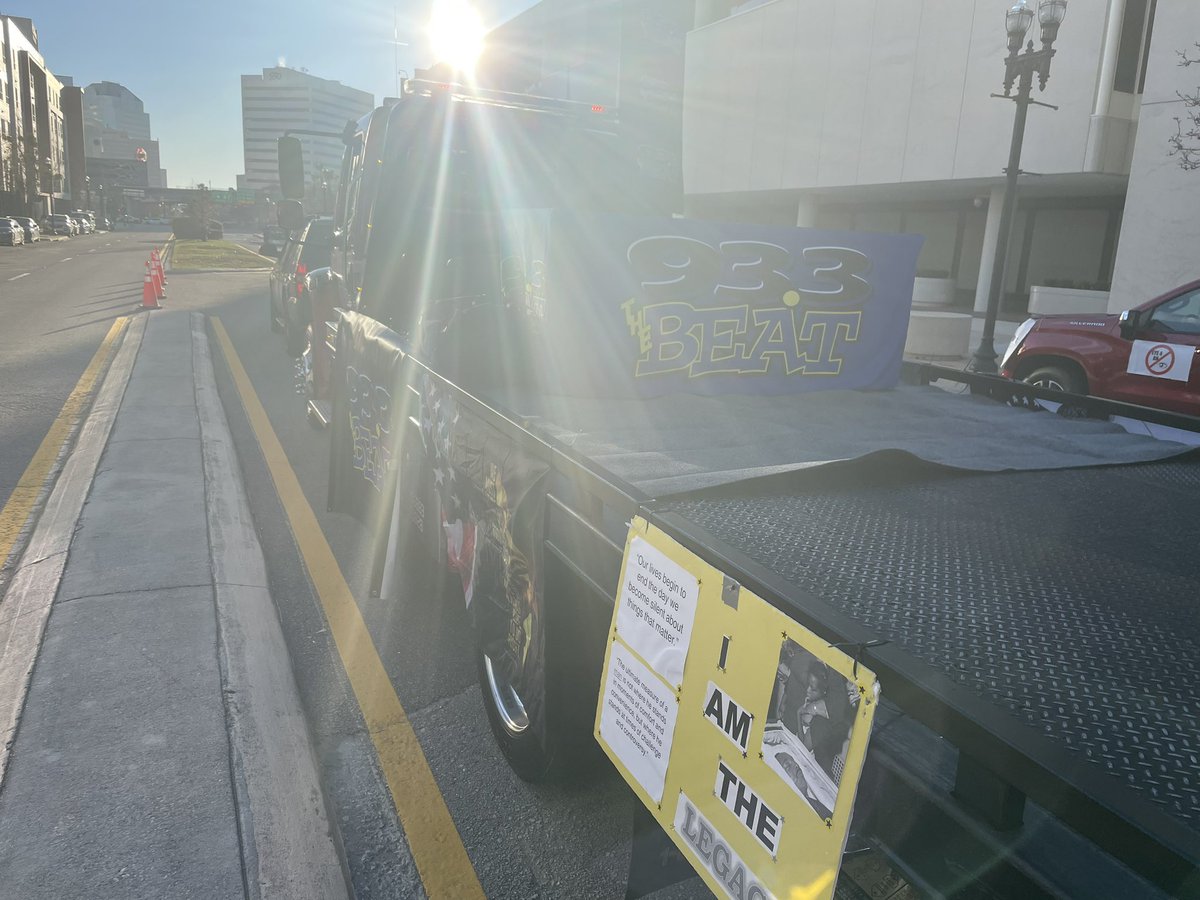 MrAWarren's tweet photo. I got a chance to participate in my first #MLKDayParade here in Jacksonville. iHeart Jacksonville had presence for @933thebeatjamz and @v1015. My wife @MrzReshina joined me as we passed out shirts from our partner the Law Office of Ron Sholes. https://t.co/2cxFzTn30V