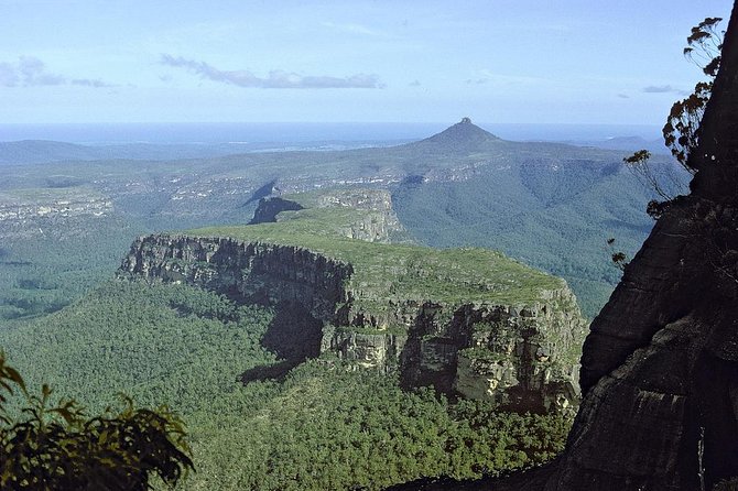 SpecialisedGeo's tweet photo. Don’t look down boys! 
The breathtaking Pigeon House Mountain is situated w/in the Morton National Park outside of Ulladulla, and with Specialised Geo’s help was recently able to re-open safely to the public. What a view! 

#specialisedgeo #rockfall #stabilisation #bestinthegame https://t.co/GiwhqLTVNj