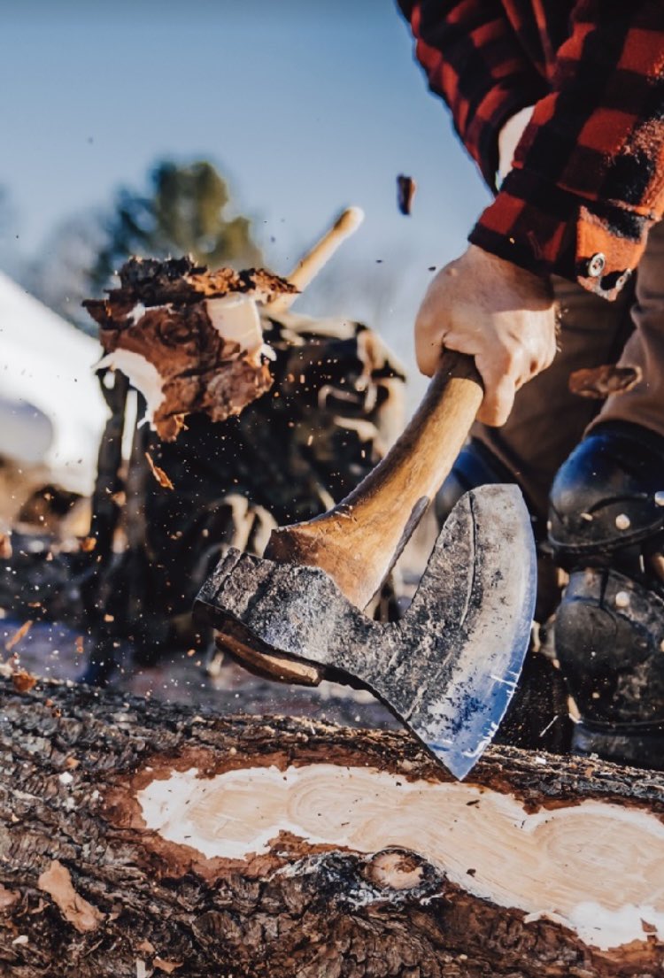 TimberLlc's tweet photo. Back-handing a broad axe to cut a channel in the bark for a chalk line. #hewing #hewn #broadaxe #maine 📷 Adam Doering https://t.co/RAXN4cUEOY