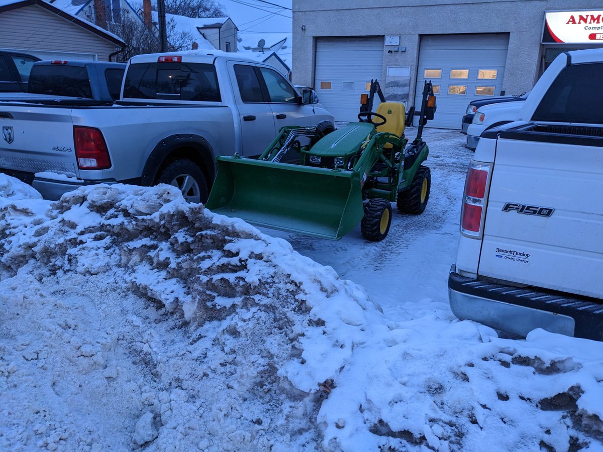 safkidd's tweet photo. @winnipeg311 Can we do something about huge pile of snow the auto dealer scooped into the sidewalk on Ellice https://t.co/ELi3RoYIMn